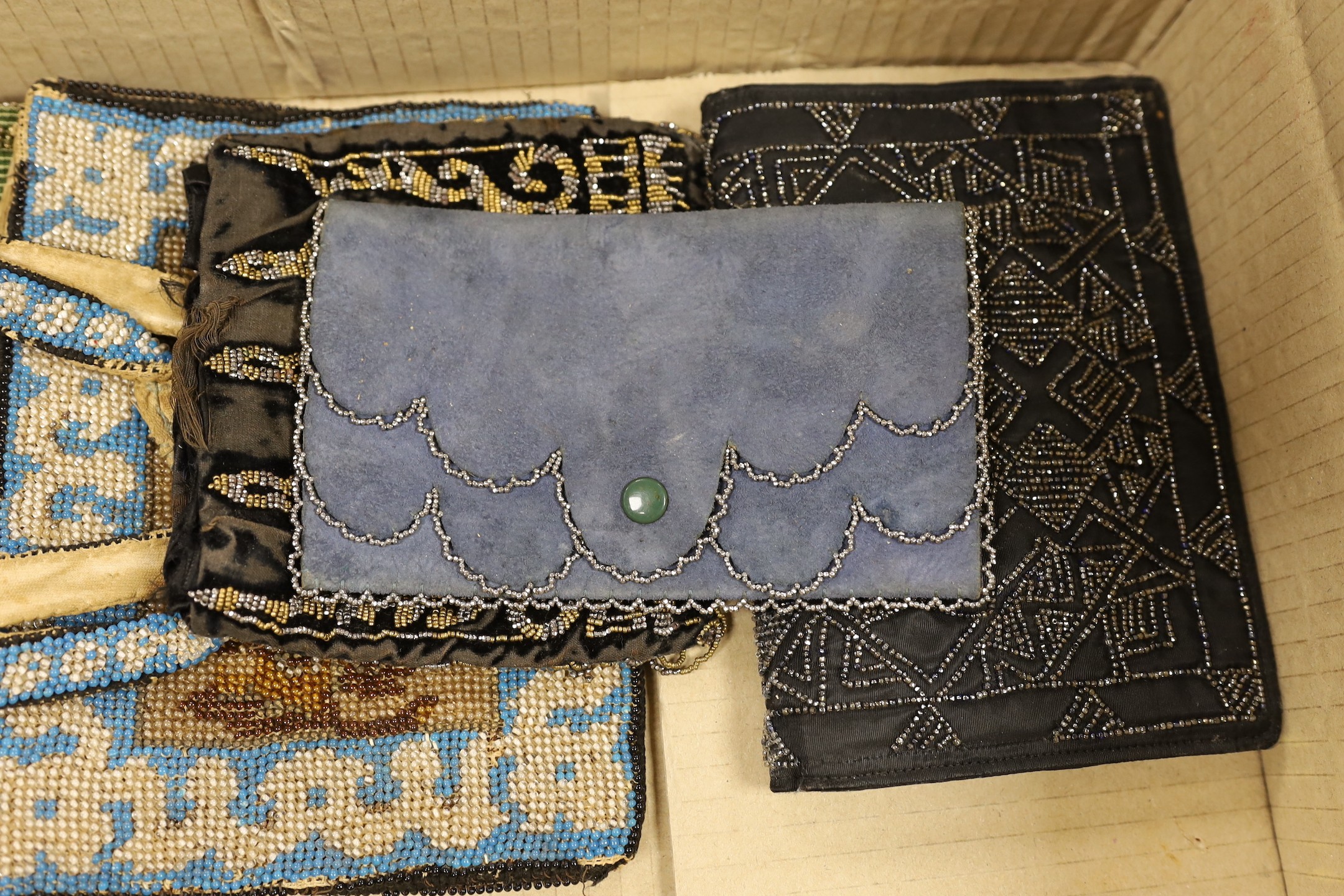 A collection nine 19th and 20th century beaded and petite point bags